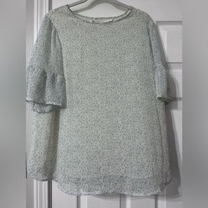 EUC cream w/ light blue flowers blouse.